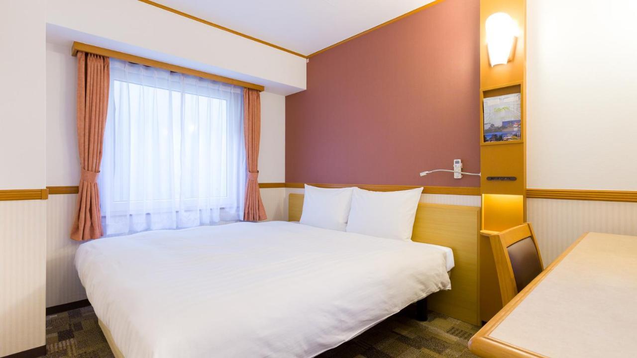 Toyoko Inn Tokyo Shinagawa-Eki Takanawa-Guchi Exterior foto